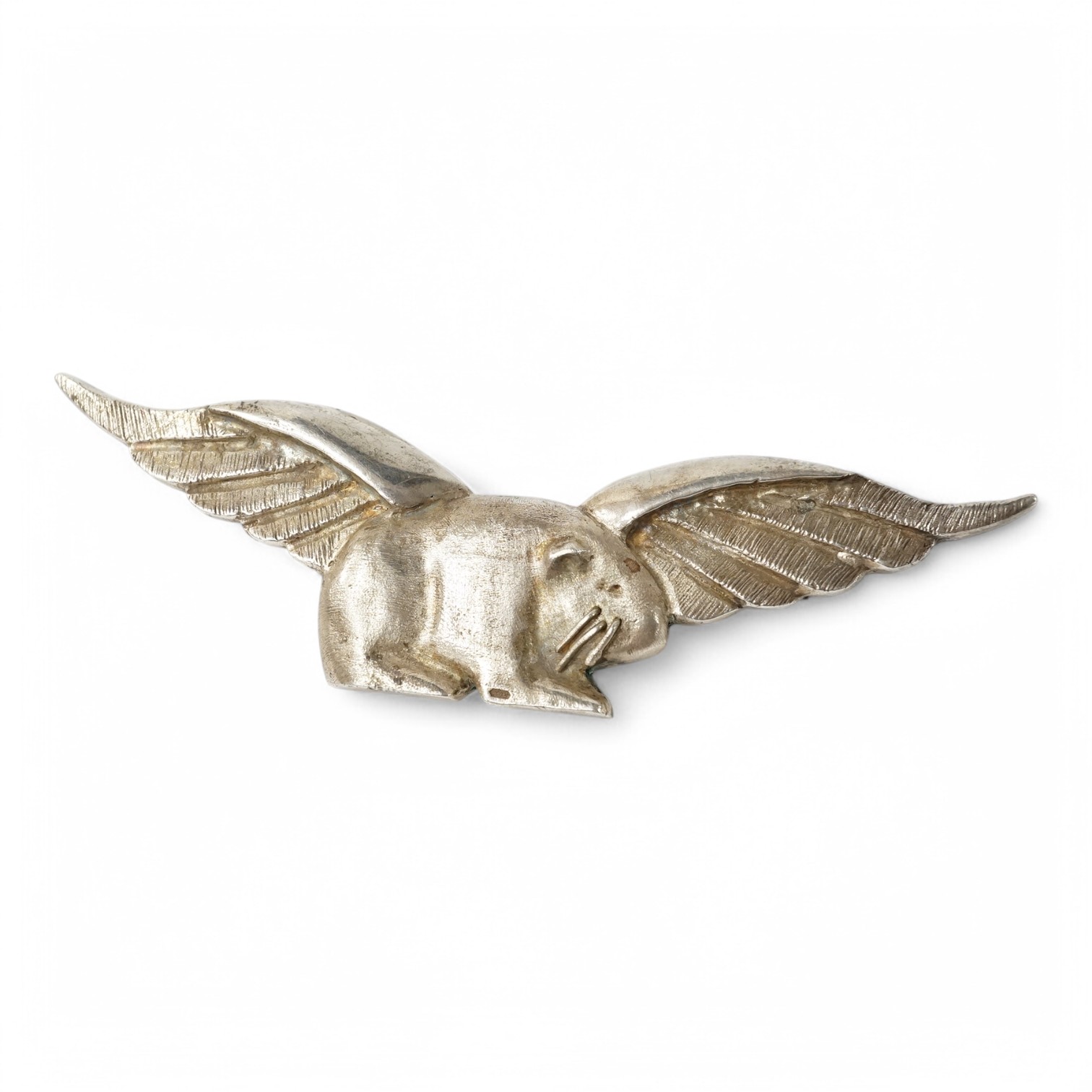 A 1980s unmarked over scale prototype for the Flying Guinea Pigs cap badge/label badge, possibly commissioned by Queen Victoria Hospital, East Grinstead or the RAF Benevolent Fund, 154g, no hall marks but tests as silver